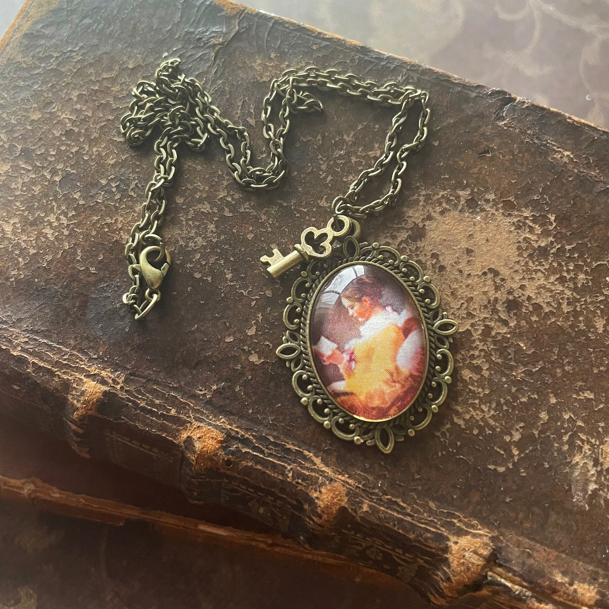 A Young Girl Reading Pendant Necklace, Bronze Necklace, Portrait Necklace, 18” bronze chain