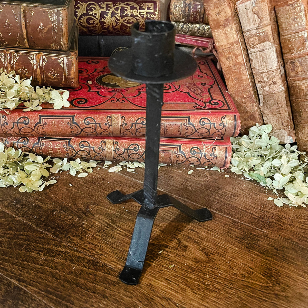 Old-World Black Iron Three-Legged Candle Stand with Flickering Wax Candle, Battery-Operated